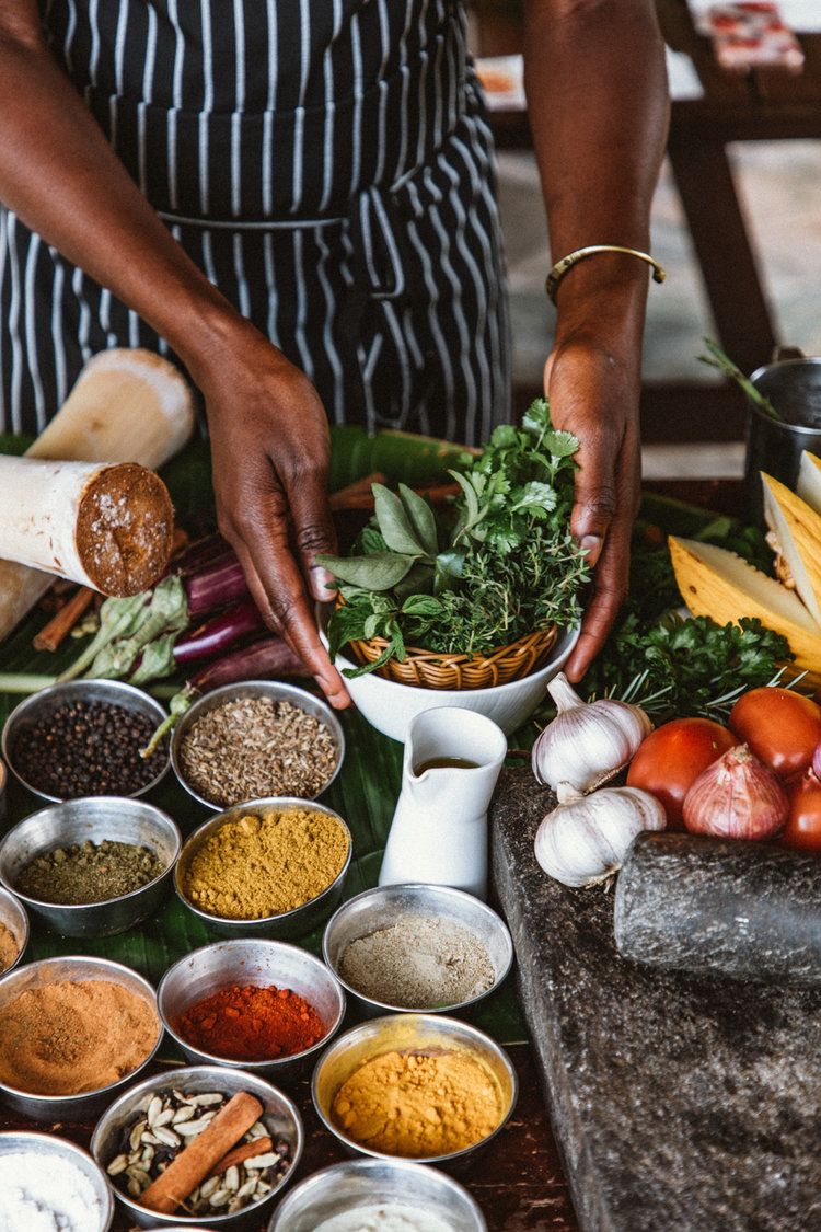 Hands preparing fresh culinary ingredients